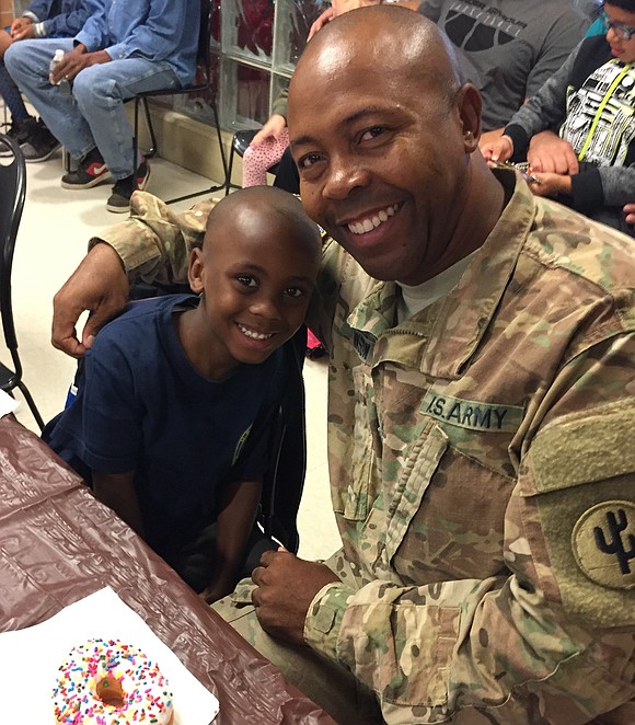 Troy Hofer Elementary School kindergartner Zyir Johnson called it his “best day ever,” when his father surprised him at a ... Troy Hofer Elementary School kindergartner Zyir Johnson called it his “best day ever,” when his father surprised him at a ...