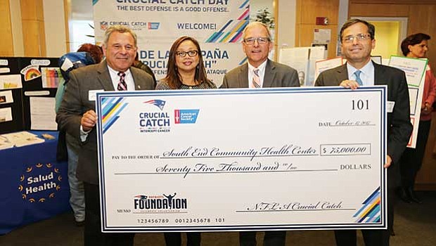 The South End Community Health Center is excited to announce its partnership with the National Football League/New England Patriots and American Cancer Society for the “Crucial Catch — Intercept Cancer” campaign. (left to right) Dr. Mark Goldberg, Eastern New England Board of Directors chairman, American Cancer Society; Monica Valdez Lupi, executive director of Boston Public Health Commission; Bill Walczak, CEO & president of South End Community Health Center; and Josh Kraft, president of the New England Patriots Charitable Foundation.
