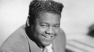 Antoine "Fats" Domino, a titan of early rock 'n' roll whose piano-based hits -- such as "Ain't That a Shame," ... Antoine "Fats" Domino, a titan of early rock 'n' roll whose piano-based hits -- such as "Ain't That a Shame," ...