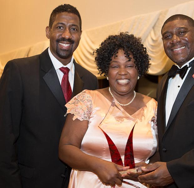 President of Kappa Community Development Corporation, Erik J. Burrell with award recipient and Retired Educator, Minretta Boone McFadden and Burlington-Camden (NJ) Alumni Chapter of Kappa Alpha Psi Fraternity, Inc., Polemarch, Richard Horton, III.