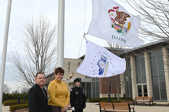 Romeoville Mayor Noak, along with State Senator Jennifer Bertino-Tarrant, raised Illinois’ bicentennial flag at village hall this week. Romeoville Mayor Noak, along with State Senator Jennifer Bertino-Tarrant, raised Illinois’ bicentennial flag at village hall this week.