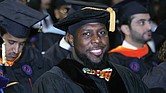 Charlottesville Vice Mayor Wes Bellamy receives his doctorate at Sunday’s ceremony, where VSU conferred degrees on 306 graduates.