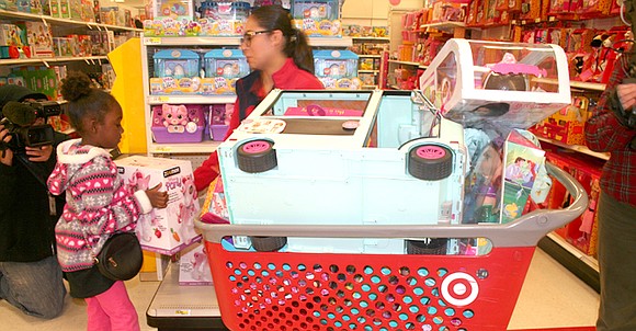 “I want that,” exclaimed 5-year-old Nevaeh Simmons as she ran up and down the Target aisles, filling two red carts ... “I want that,” exclaimed 5-year-old Nevaeh Simmons as she ran up and down the Target aisles, filling two red carts ...