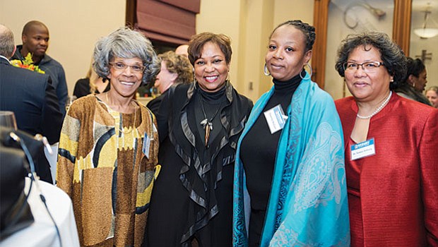 Dr. Valerie Roberson enjoys the welcome reception with other guests.