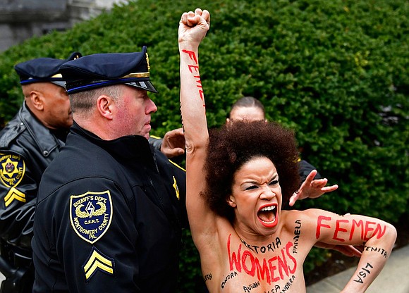 The topless protester who leaped over a barricade and ran toward Bill Cosby at the start of his sexual assault ... The topless protester who leaped over a barricade and ran toward Bill Cosby at the start of his sexual assault ...