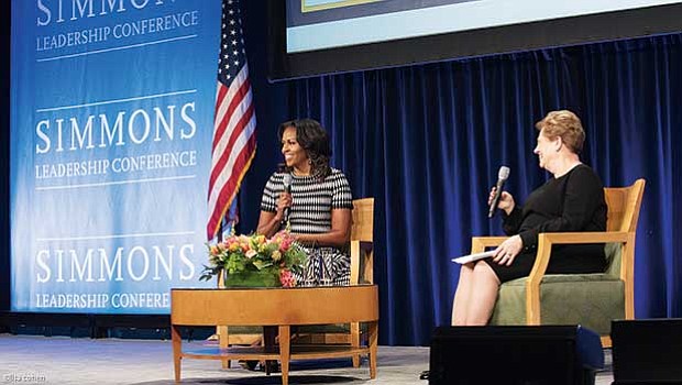 Former First Lady Michelle Obama and Simmons College President Helen G. Drinan share the stage during the Simmons Leadership Conference last week.
