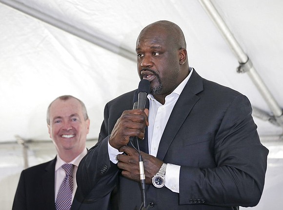 Former NBA star Shaquille O'Neal is opening a high-rise apartment complex in New Jersey's largest city. Former NBA star Shaquille O'Neal is opening a high-rise apartment complex in New Jersey's largest city.