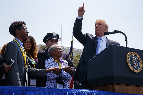 President Donald Trump paid emotional tribute Tuesday to fallen law enforcement officers and the loved ones who carry on without ... President Donald Trump paid emotional tribute Tuesday to fallen law enforcement officers and the loved ones who carry on without ...