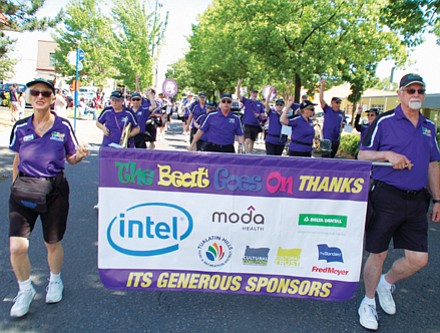 The Beat Goes On march band floods the streets with music.
