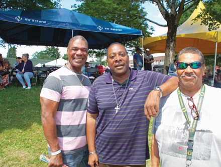 Otha Tyler (from left), Alex Spearman, and Glenn Harper enjoy Good in the Hood festivities at Martin Luther King School Park.