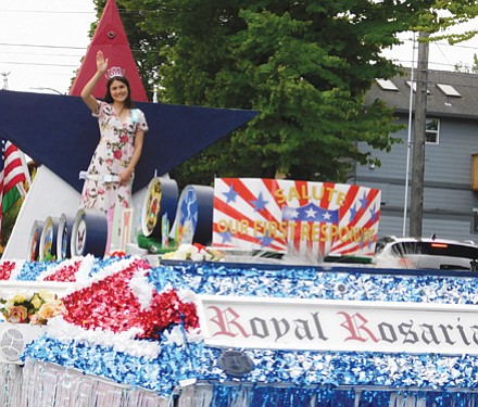 A float sponsored by Portland’s Royal Rosarians, ambassadors of goodwill, salute first responders.
