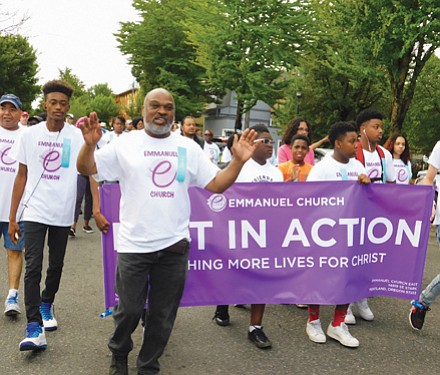 Emmanuel Temple’s congregation shows out for Saturday’s parade.