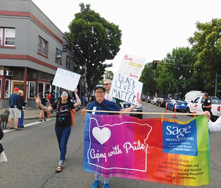 Services and Advocacy for Gay, Lesbian, Bisexual, & Transgender Elders, march with pride for the Good in the Hood parade.