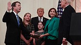 With President Trump watching, Justice Brett Kavanaugh is sworn in as a U.S. Supreme Court associate justice Monday during a televised ceremony in the East Room at the White House. Retired Justice Anthony Kennedy, who Justice Kavanaugh replaces on the nation’s high court, performed the ceremony. With the new justice are his wife, Ashley, and daughters Margaret, left, and Liza.