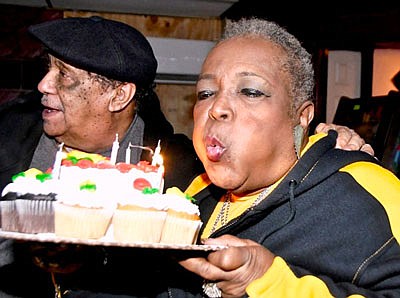 Rosa and her :Boo-Boo” (Shorty) at Roots Lounge on Smallwood and Vine Streets in West Baltimore. I needed a lot of wind to blow out all my candles on my cake.