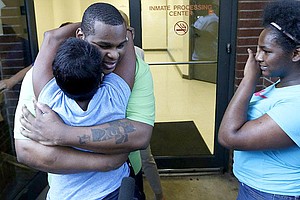 Alfred Dewayne Brown hugged his sister Connie Brown on the day of his release, June 8, 2015.