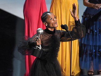 Letitia Wright accepts the award for outstanding breakthrough performance in a motion picture for her role in “Black Panther” at the NAACP Image Awards last Saturday in Los Angeles.