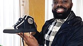 Michael D. Duke hopes to carve out his niche in high-fashion footwear starting with a sneaker line he designed and is selling on line. An Italian company produces the leather and suede shoe.