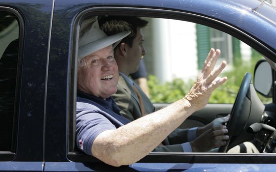 Sen. Edward M. Kennedy, D-Mass., waves as he returns to his Hyannis Port home on Monday, one week... Sen. Edward M. Kennedy, D-Mass., waves as he returns to his Hyannis Port home on Monday, one week...