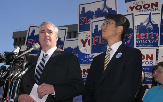 City Councilor-at-Large Michael F. Flaherty (left) speaks while fellow at-large... City Councilor-at-Large Michael F. Flaherty (left) speaks while fellow at-large...