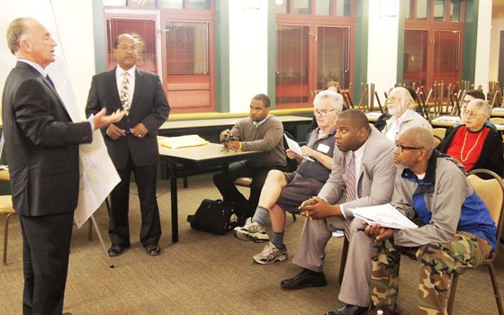 City councilors Bill Linehan and Charles Yancey explain the city’s redistricting process to an audience, including Councilor Tito... City councilors Bill Linehan and Charles Yancey explain the city’s redistricting process to an audience, including Councilor Tito...