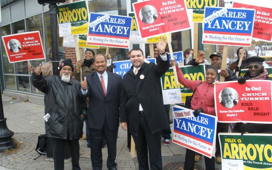 City Councilors Chuck Turner (left) and Charles Yancey (center) celebrate Felix Arroyo’s (third from left) decisive victory in... City Councilors Chuck Turner (left) and Charles Yancey (center) celebrate Felix Arroyo’s (third from left) decisive victory in...