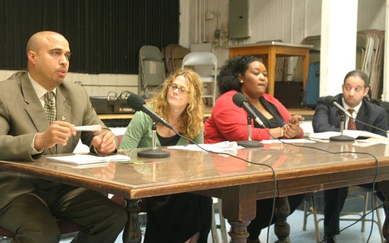 Winston Cox makes a point as Susan Eaton, Janine Quarles and Sam Depina listen during a forum on... Winston Cox makes a point as Susan Eaton, Janine Quarles and Sam Depina listen during a forum on...
