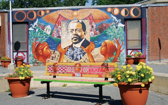 A mural celebrating “The Guardian’s” publisher at the William Monore Trotter Elementary School in Dorchester. (Banner file photo)... A mural celebrating “The Guardian’s” publisher at the William Monore Trotter Elementary School in Dorchester. (Banner file photo)...