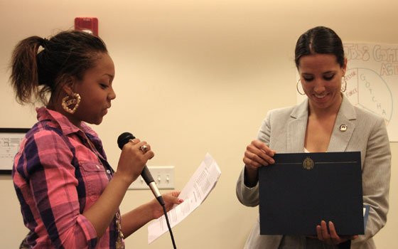 Ashlee Smith of the Dorchester Bay Economic Development Corporation’s Youth Force (left) presents an award to state Sen.... Ashlee Smith of the Dorchester Bay Economic Development Corporation’s Youth Force (left) presents an award to state Sen....