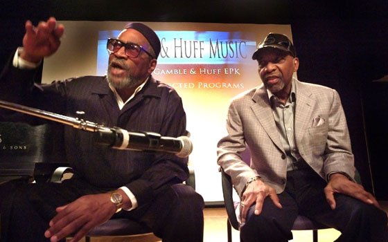 Kenny Gamble (I) makes a point, as Leon Huff listens, during a special session with press and students... Kenny Gamble (I) makes a point, as Leon Huff listens, during a special session with press and students...