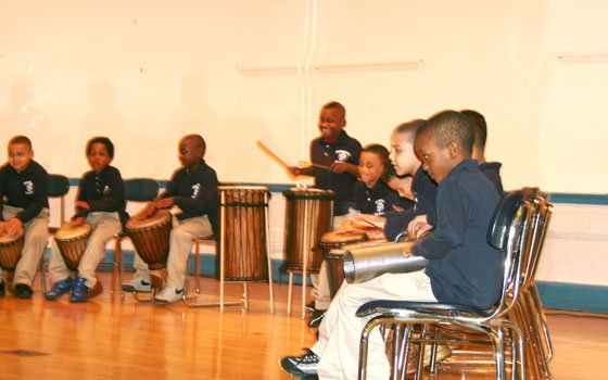 Students from Higginson-Lewis School play the drums at the 100th Anniversary “We Dare to Dream of Excellence” party on... Students from Higginson-Lewis School play the drums at the 100th Anniversary “We Dare to Dream of Excellence” party on...