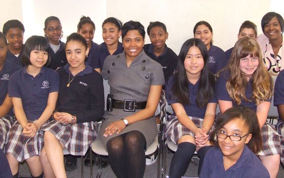 Angela Burt-Murray (center), editor-in-chief of Essence magazine, meets with students at Mother Caroline Academy, an all-girls Catholic middle... Angela Burt-Murray (center), editor-in-chief of Essence magazine, meets with students at Mother Caroline Academy, an all-girls Catholic middle...