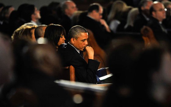 President Barack Obama and First Lady Michelle Obama shared a somber moment at the Interfaith and Healing Service... President Barack Obama and First Lady Michelle Obama shared a somber moment at the Interfaith and Healing Service...