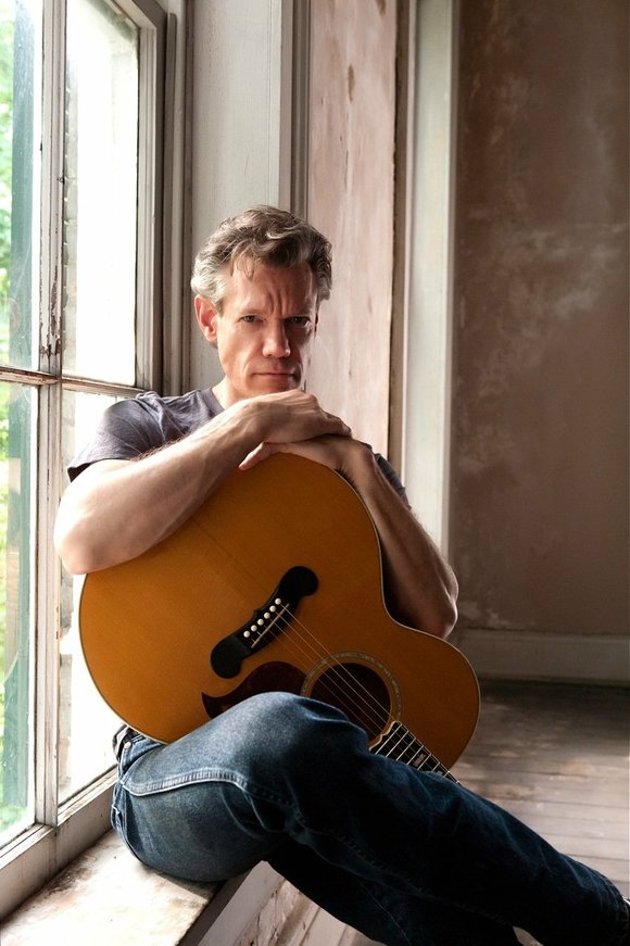 Randy Travis credits his recovery from a life-threatening stroke to "amazing grace."