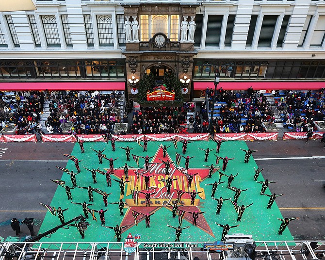 The South Shore Drill Team performs in the 87th Macy’s Thanksgiving Day Parade in New York City on Nov. 28, 2013. 	