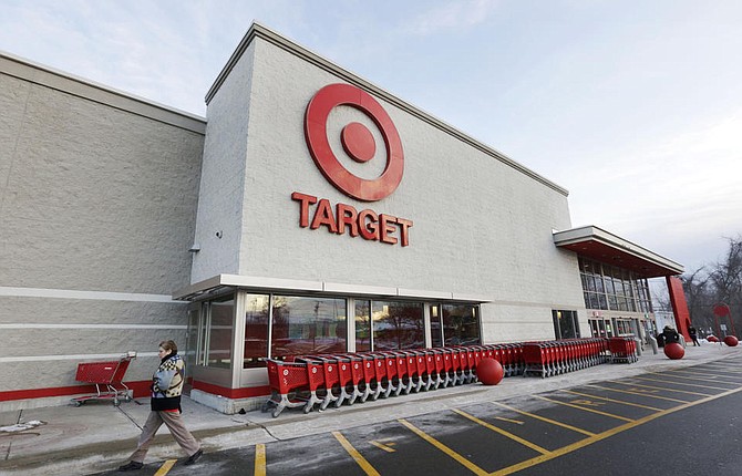 Target on Friday, Dec. 27, 2013 said that customers' encrypted PIN data was removed during the data breach that occurred earlier this month. But the company says it believes the PIN numbers are still safe because the information was strongly encrypted. (AP Photo/Steven Senne, File)