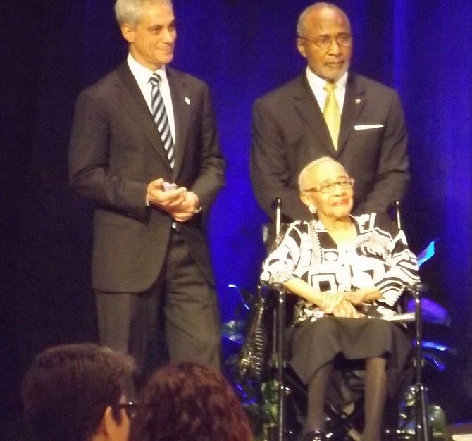Mayor Rahm Emanuel presents the Rev. Dr. Willie Taplin Barrow with the City of Chicago's Champion of Freedom Award for her tireless commitment to the Civil Rights movement. Barrow is joined on stage by her aide.