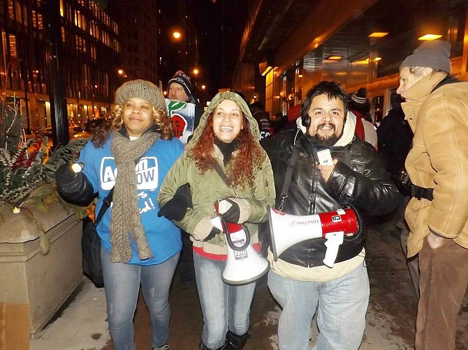 Action Now leader Zerlina Smith (left) rallying at CPS Headquarters with fellow parent leader Rousemary Vega (center) and education activist Chuy Campuzano (right).