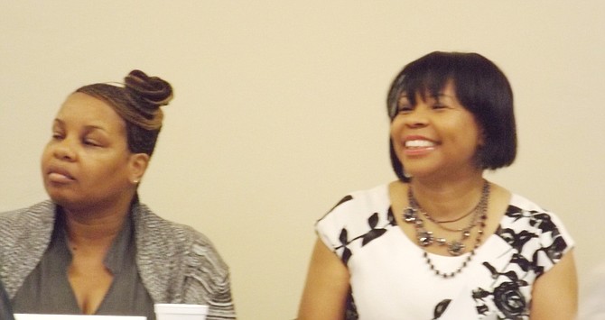 (L-R) Patrice Daniels, contract compliance administrator for the Forest Preserve District of Cook County, served as guest speaker for the Chatham Business Association monthly meeting on Tuesday.  Melinda Kelly, Chatham Business Association's executive director is seated next to her.