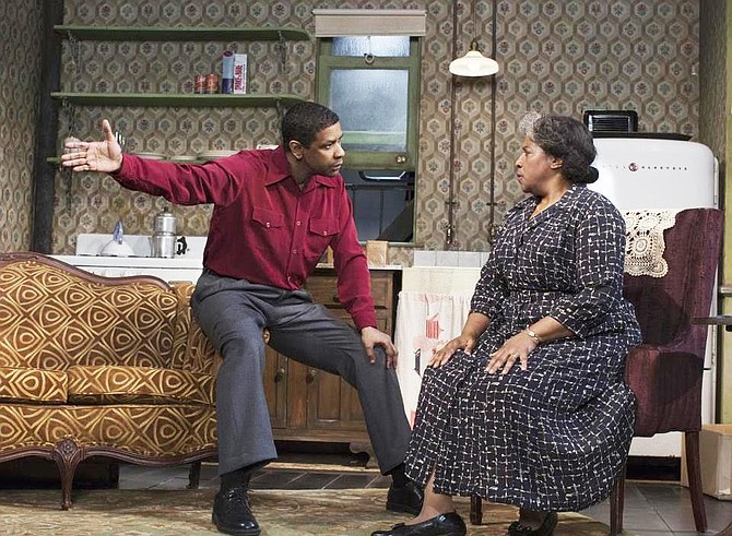 Denzel Washington, left, and LaTanya Richardson Jackson during a performance of "A Raisin in the Sun," at the Ethel Barrymore Theatre in New York.
