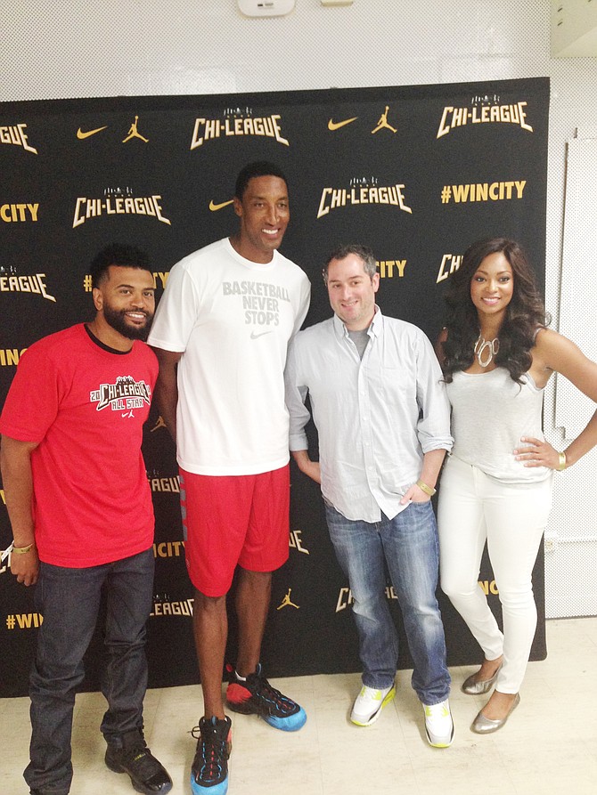 Power 92 radio station personality, Shagg; Chicago Bulls great, Scottie Pippen; ESPN reporter Jon Greenberg; and NBC Chicago reporter, Michelle Relerford, pose for a picture after judging the Chi League All Stage Game dunk competition. 