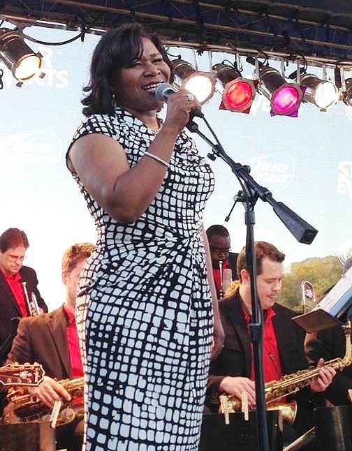 Vocalist Tammy McCann performs during the Chicago Jazz Orchestra in 2013.  In 2007, the University of Chicago, the Hyde Park Jazz Society, and several community stakeholders and supporters organized the first Hyde Park Jazz Fest.