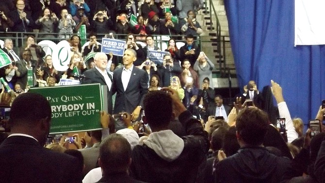 President Barack Obama (pictured right) joins Ill. Gov. Pat Quinn on stage Sunday during Quinn’s Early Vote campaign rally held at Chicago State University's Emil and Patricia Jones Convocation Center, 9501 S. King Dr., Oct. 19, 2014.