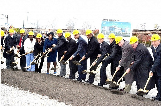 Pictured 6th and 9th from left, U.S. Cong. Bobby Rush and Ald. Willie B. Cochran take part in the groundbreaking ceremony for St. Bernard Hospital’s new 70,000 square-foot Ambulatory Care Center, at 63rd Street and Steward Ave., Oct. 29, 2014.