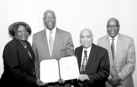 (L-R): MWRD Vice President Barbara McGowan, Rev. Larry Bullock, President and Chief Executive Officer of the U.S. Minority Contractors Association (USMCA), Commissioner Frank Avila and MWRD Senior Diversity Officer Lindsey Gayles. 