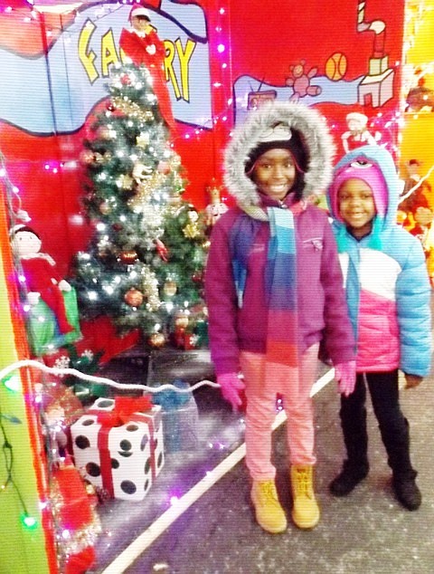 L-R: Shantavia McGill and Armani Thomas enjoy Prologue Inc.’s Winter Wonderland event on Saturday, Dec. 20, 2014.