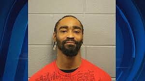 Aries Woodfin, 33 was arrested  Dec. 27 and charged in Cook County Criminal Court with various weapons violations after his alleged Facebook threats against police and "little white children." Woodfin was not charged with the Facebook threats.