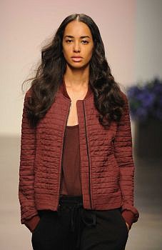 A model wears a marsala-hued jacket in the En Noir fashion show during Mercedes-Benz Fashion Week's Spring 2015 collections.