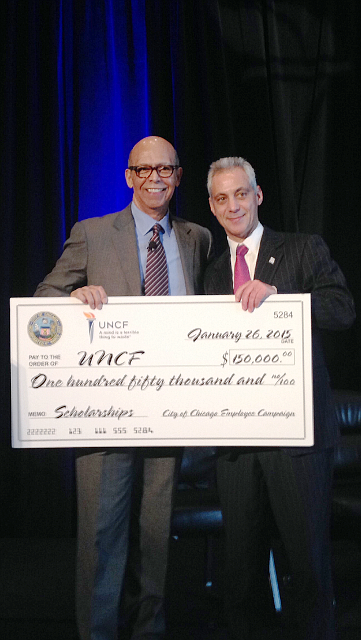 Dr. Michael L. Lomax, Ph.D, President and CEO, United Negro College Fund (UNCF) and Chicago Mayor Rahm Emanuel hold a check from the City of Chicago Employee Campaign for $150,000 that was donated to UNCF during  the organization’s Inaugural Mayor's Luncheon.