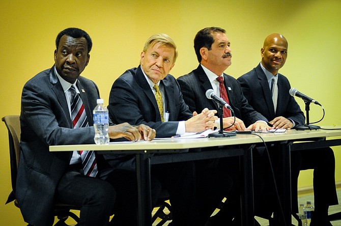 L-R Chicago mayoral candidates Dr. Willie Wilson, Ald. Bob Fioretti (2nd Ward), Cook County Commissioner Jesus "Chuy" Garcia and William "Doc" Walls. Photo: John Alexander